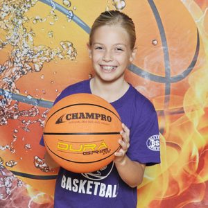 girl holding basketball